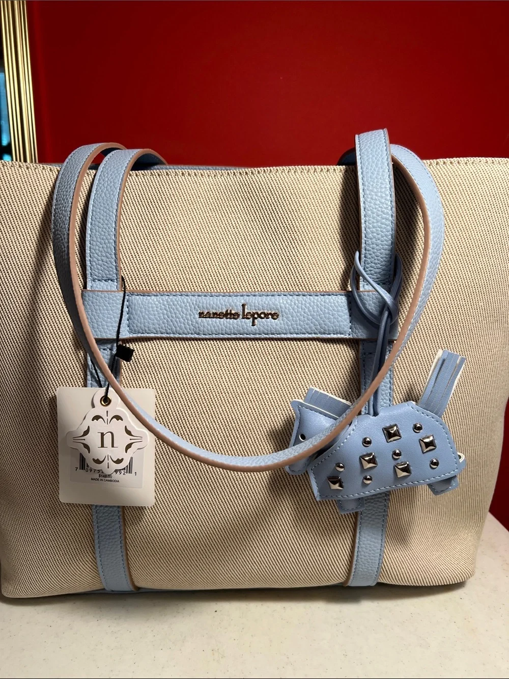 Nanette Lepore Beige Canvas Tote with Light Blue Leather Trim and Charm  RT,148